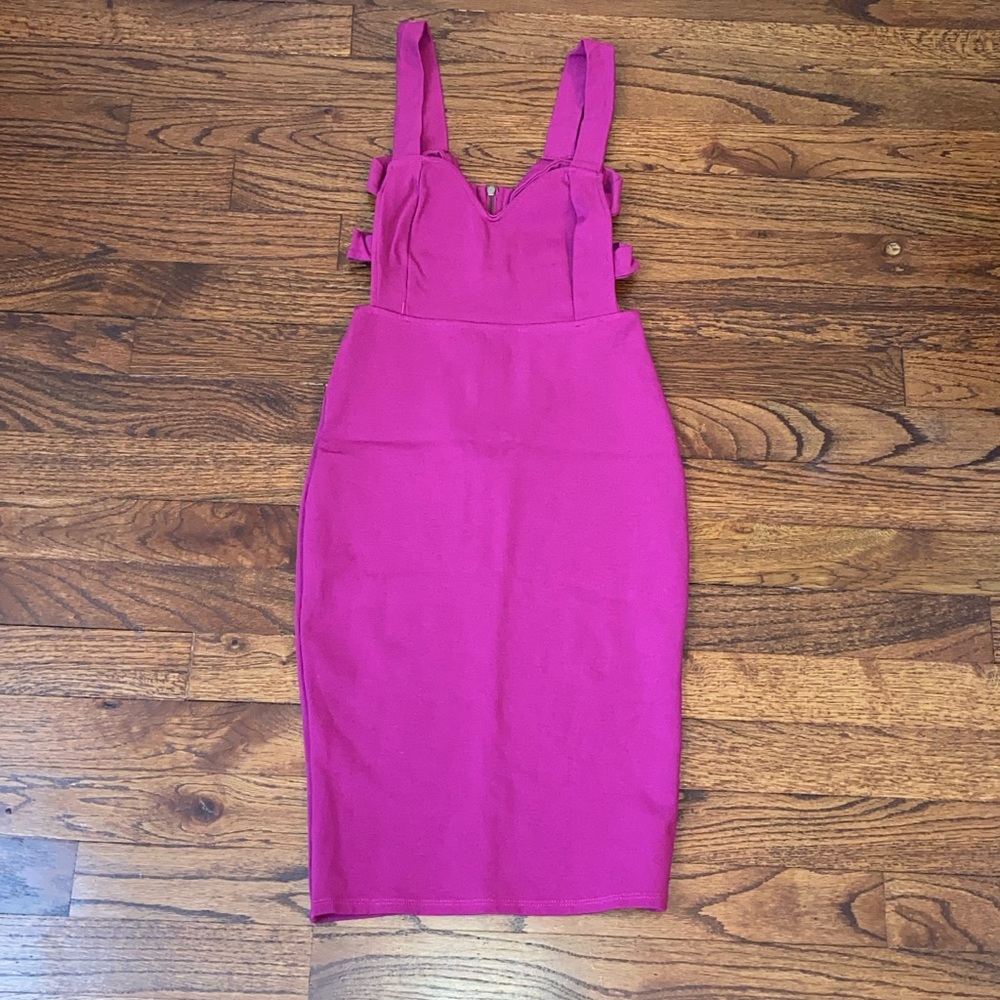 Violet bodycon dress with back strap detail.